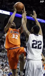 Illinois guard Demetri McCamey goes up for a shot over Penn State forward Andrew Jones during the first half. (AP Photo/Carolyn Kaster)