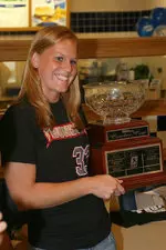 Former Illini Shanna Diller with the Cowles Cup after winning the NPF championship with the Rockford Thunder.
