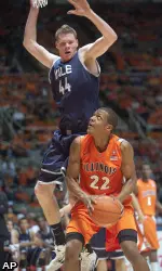 Jereme Richmond (22) catches Yale Greg Mangano (44) out of position. (AP)