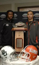Baylor QB Robert Griffin III and Illini QB Nathan Scheelhaase pose with the Texas Bowl trophy