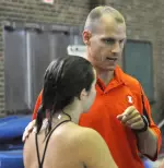 Diving coach Waters and sophomore Britni Fisher discuss her next dives.