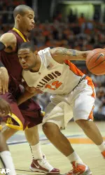 Illinois' Demetri McCamey (32) drives against Minnesota Justin Cobbs (3) during the first half of an NCAA college basketball game at the Assembly Hall in Champaign, Ill. on Saturday, Feb. 27, 2010. (AP Photo/Robert K. O'Daniell)