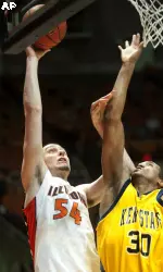Mike Tisdale gets a shot inside in the first half.