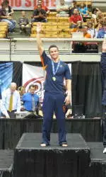 Junior Paul Ruggeri won Big Ten titles on vault and high bar Saturday night.