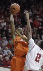 Illinois forward Mike Davis (24) shoots over Indiana forward Christian Watford (2).