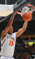 Mike Shaw dunks in the second half against Chicago State.