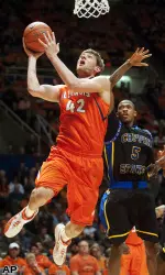 Illinois forward Tyler Griffey (42) shoots past Coppin State guard Michael Harper (5).