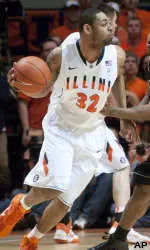 Illinois guard Demetri McCamey (32) moves past Purdue forward/center JaJuan Johnson.