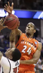 Illinois forward Mike Davis blocks a shot by UNLV guard Tre'Von Willis in the first half of a Southwest Regional NCAA tournament second round college basketball game, Friday, March 18, 2011 in Tulsa, Okla. (AP Photo/Charlie Riedel)
