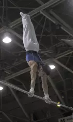 Junior Tyler Mizoguchi set new career highs on four of six events and set a new school record in the all-around.