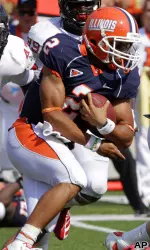Nathan Scheelhaase scrambles in the pocket.