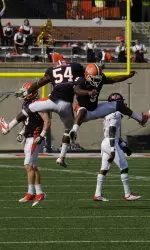 Justin Staples and Trulon Henry celebrate after Illinois' 33-15 win over Arkansas State.