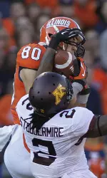 Spencer Harris holds on to a pass. (AP Photo/Seth Perlman)