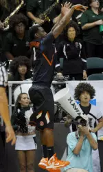 Illinois' D.J. Richardson launches his game winning 3-pointer as Hawaii's Hauns Brereton charges up to him. Honolulu Star-Advertiser photo by Bruce Asato