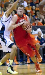 Chaminade forward Tyree Harrison, left, defends Illinois forward Tyler Griffey. (AP Photo/Eugene Tanner)