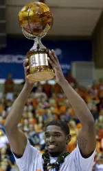 Brandon Paul holds up his tournament MVP trophy.