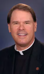 University of Illinois chaplain and director of the St. John's Catholic Newman Centrer Monsignor Gregory Ketcham was named the 2012 recipient of the Father John P. Smyth Award.