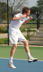 Freshman Ross Guignon celebrates after clinching the match for the Illini on Sunday.