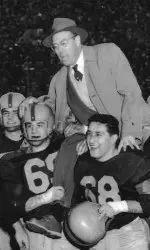 The Illini carried head coach Ray Eliot off the field after a 40-7 win over Stanford in the Rose Bowl.