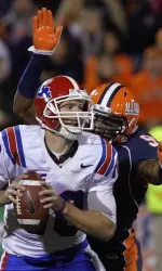 Michael Buchanan sacks Louisiana Tech quarterback Colby Cameron. (AP Photo/Seth Perlman)