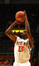 Guard Tracy Abrams shoots over Crusaders defense in the first half.