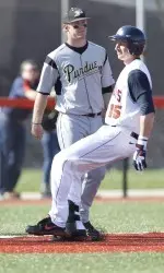 Senior Justin Parr coasted into third for a stand-up triple to complete the cycle during an eight-run eighth inning for the Illini.