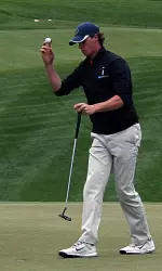 Thomas Pieters acknowledges the crowd after sinking a birdie putt on No. 18 to seal his individual victory at the Big Ten Championships.