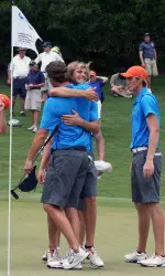 Thomas Detry hugs Thomas Pieters after Pieters beat Cal's Max Homa to clinch Illinois' semifinal win.
