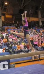 Sunny Kato took home individual titles on both bars and beam Friday night.