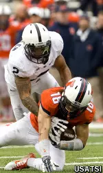 Mike Dudek makes a catch while covered by Penn State's Marcus Allen.
