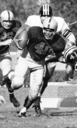Woodson starred on the track and on the football field at Illinois.