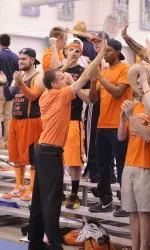 Coach Dancer celebrating the win with the Net Nuts fan section