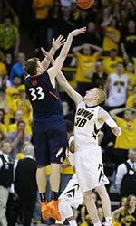 Jon Ekey hit the game-winning three-pointer with 0.5 left on the clock. (AP Photo/Charlie Neibergall)