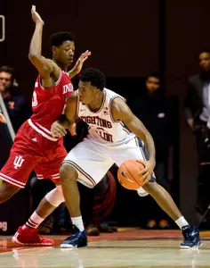Jan 18, 2015; Champaign, IL, USA; Illinois Fighting Illini forward Leron Black (12) drives to the basket defended by Indiana Hoosiers forward Emmitt Holt (25) at State Farm Center. Indiana beat Illinois 80 to 74. Mandatory Credit: Mike Granse-USA TODAY Sports