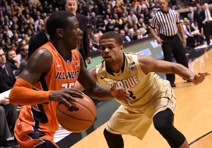Mar 7, 2015; West Lafayette, IN, USA; Purdue Boilermakers guard P.J. Thompson (3) defends against Illinois Fighting Illini guard Kendrick Nunn (25) in the second half at Mackey Arena. Mandatory Credit: Sandra Dukes-USA TODAY Sports