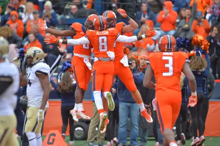 Geronimo Allison celebrates a touchdown with his teammates vs. Purdue