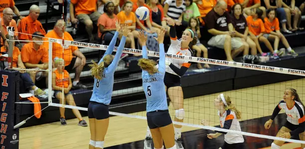 Liz McMahon swings over the UNC block