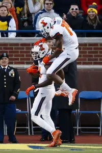 Malik Turner Justin Hardee NCAA Football: Illinois at Michigan