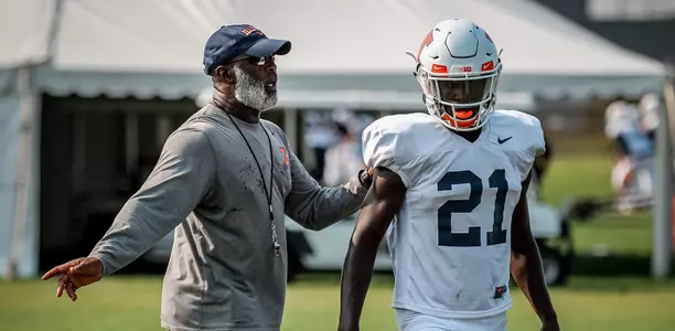 Lovie Smith and Jartavius Martin at Training Camp Practice - Aug. 14, 2018