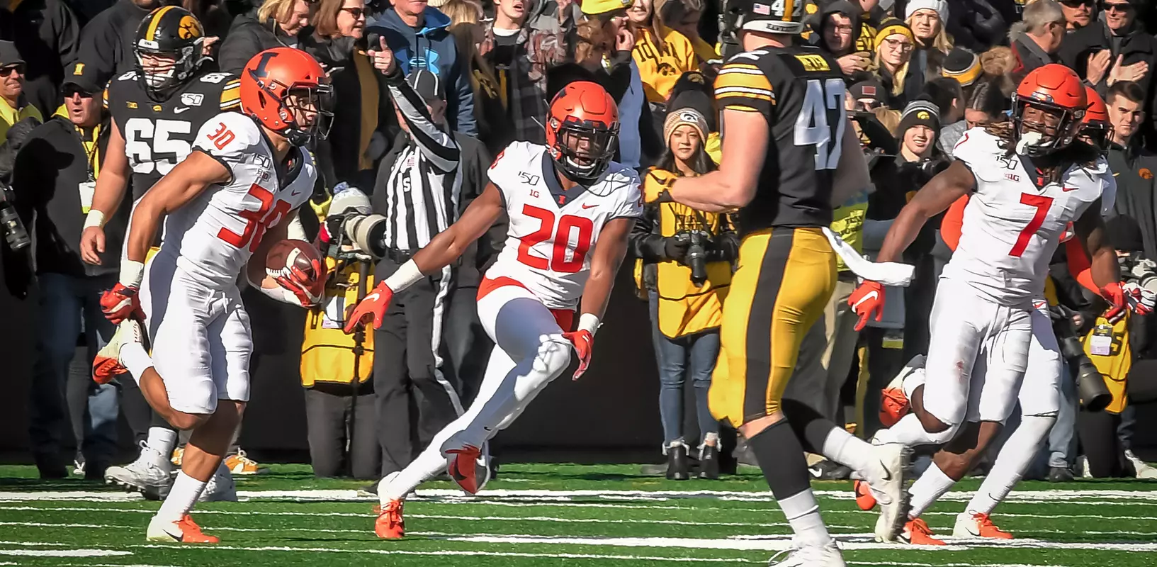 Illinois Fighting Illini defensive back Sydney Brown (30) interception celebration, Illinois Fighting Illini defensive back Nick Walker (20), Illinois Fighting Illini defensive back Stanley Green (7)Illinois Football at Iowa in Iowa City, IowaNovember 21, 2019