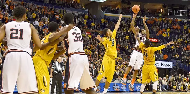 Dec 20, 2014; St. Louis, MO, USA; Illinois Fighting Illini guard Rayvonte Rice (24) shoots the ball for the game winning three pointer against the Missouri Tigers during the second half at Scottrade Center. The Illinois Fighting Illini defeat the Missouri Tigers 62-59. Mandatory Credit: Jasen Vinlove-USA TODAY Sports