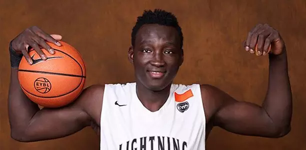 Bernard Kouma signs