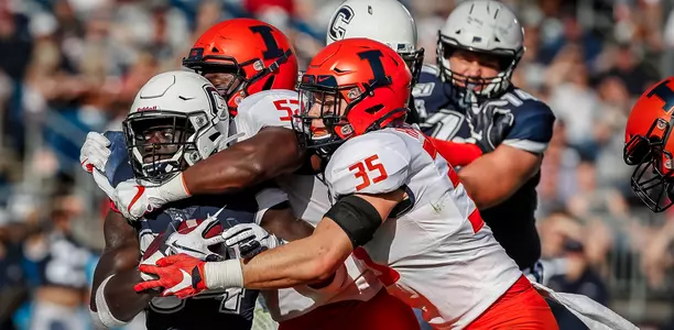 Illinois Fighting Illini linebacker Jake Hansen (35)m Illinois Fighting Illini defensive lineman Ayo Shogbonyo (52)Illinois Football at Connecticut in East Hartford, ConnecticutSeptember 07, 2019