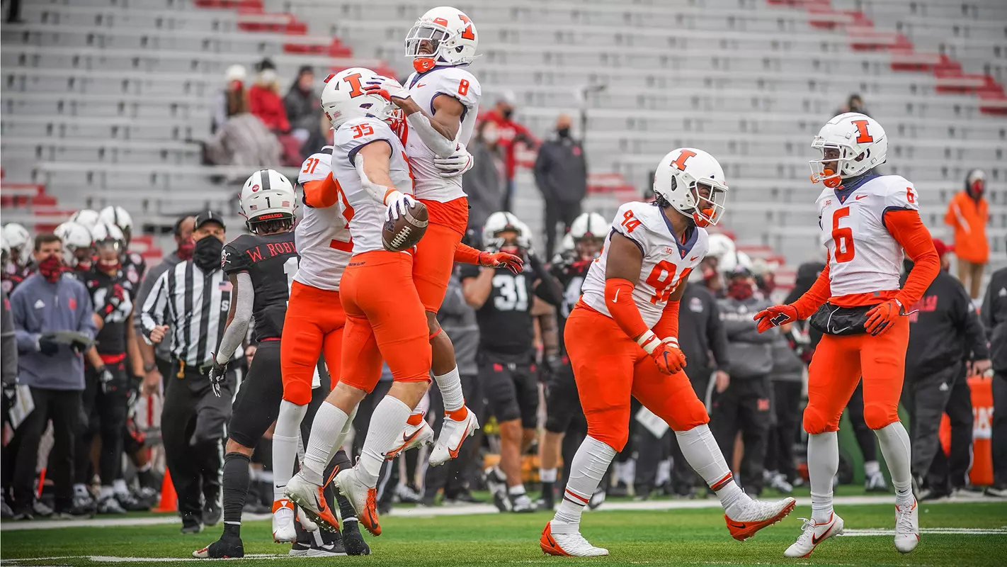 Illinois Fighting Illini linebacker Jake Hansen (35), Illinois Fighting Illini defensive back Nate Hobbs (8) defense celebrationIllinois Fighting Illini Football at Nebraska - 11/21/20
