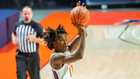 Nov 25, 2020; Champaign, Illinois, USA; Illinois Fighting Illini guard Ayo Dosunmu (11) hits a three point shot during the first half against the North Carolina A&T Aggies at the State Farm Center. Mandatory Credit: Patrick Gorski-USA TODAY Sports