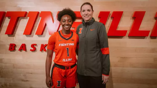 Kam'Ren Rhodes with head coach Shauna Green