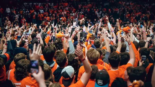 Fans on court celebrating