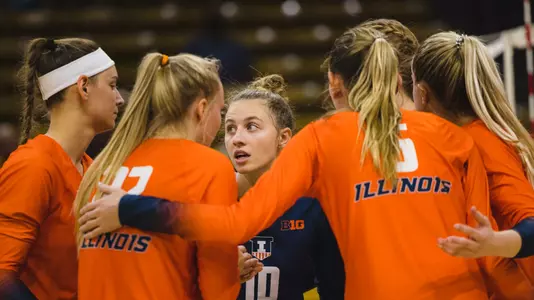 Illini volleyball team huddle Caroline Barnes
