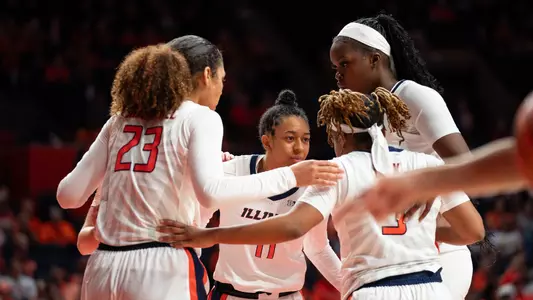 CHAMPAIGN, IL - December 10, 2023 - Illinois Guard Jada Peebles (#11), Illinois Forward Brynn Shoup-Hill (#23), Illinois Guard Makira Cook (#3) and Illinois Center Aicha Ndour (#21) during the game between the Michigan Wolverines and the Illinois Fighting Illini at State Farm Center in Champaign, IL. Photo By Kevin Snyder