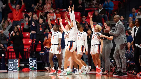 CHAMPAIGN, IL - January 07, 2024 - Illinois Forward Brynn Shoup-Hill (#23), Illinois Guard Camille Jackson (#0), Illinois Guard Cori Allen (#2) and Illinois Assistant Coach DeAntoine Beasley during the game between the Wisconsin Badgers and the Illinois Fighting Illini at State Farm Center in Champaign, IL. Photo By Kevin Snyder
